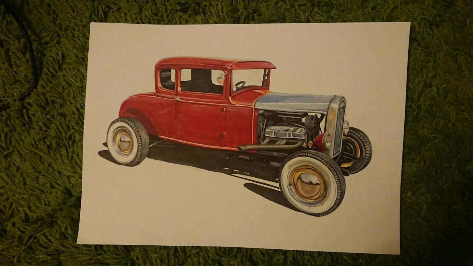 Red classic hot rod with exposed engine